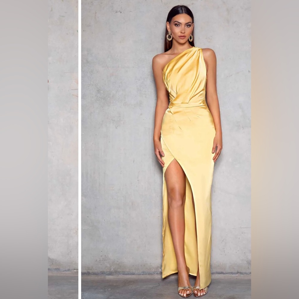 Brand new with tags. Gorgeous yellow gown. Prefer for weddings or any parties.